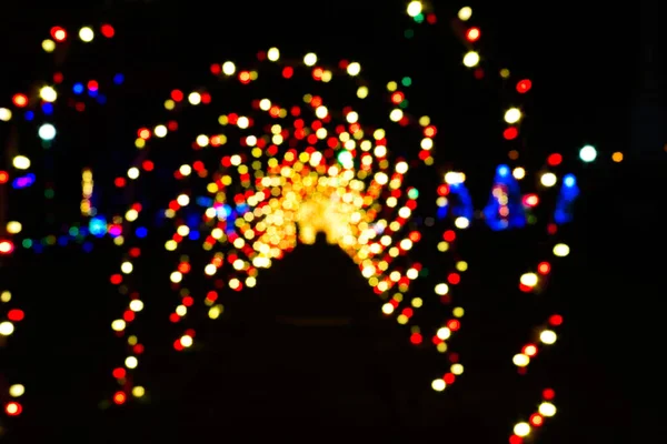 Túnel Luzes Natal Arcos Intencionalmente Borrado Para Efeito Abstrato — Fotografia de Stock