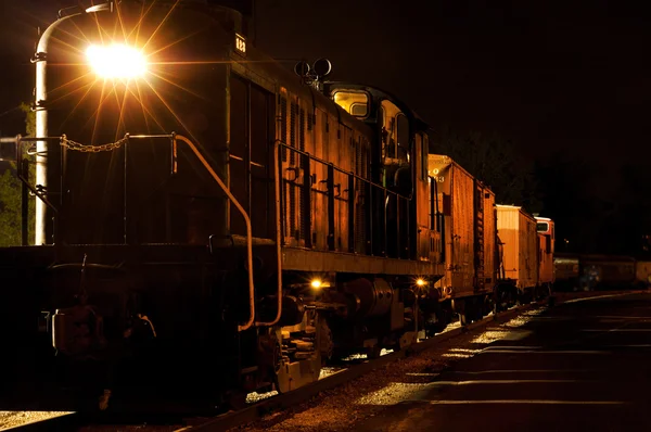 Night train glowing orange — Stock Photo, Image