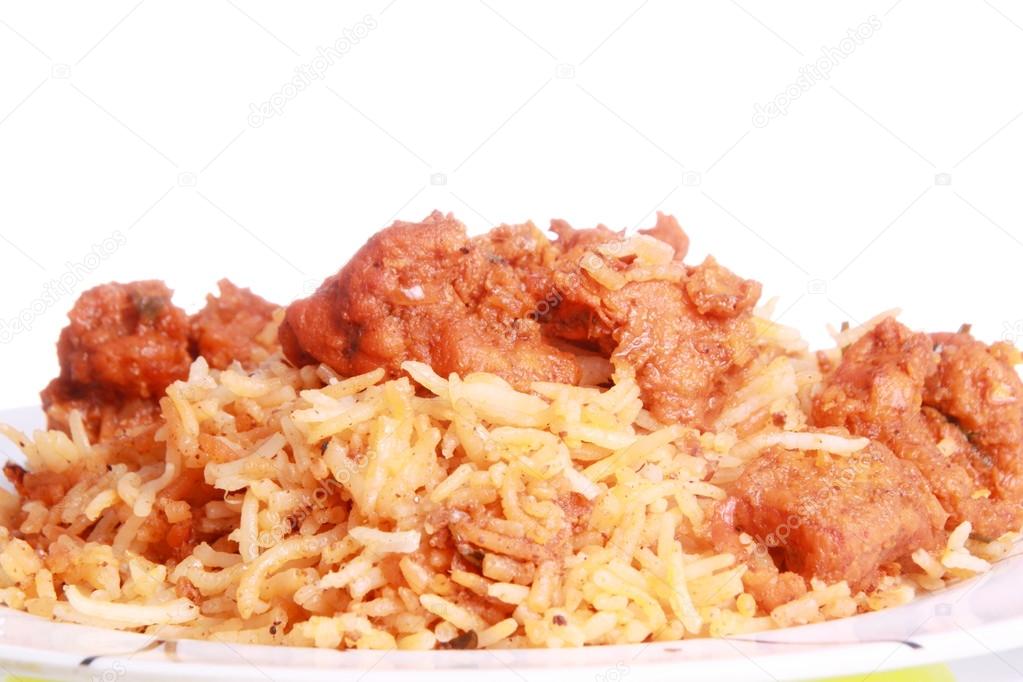 Chicken curry over chicken biryani