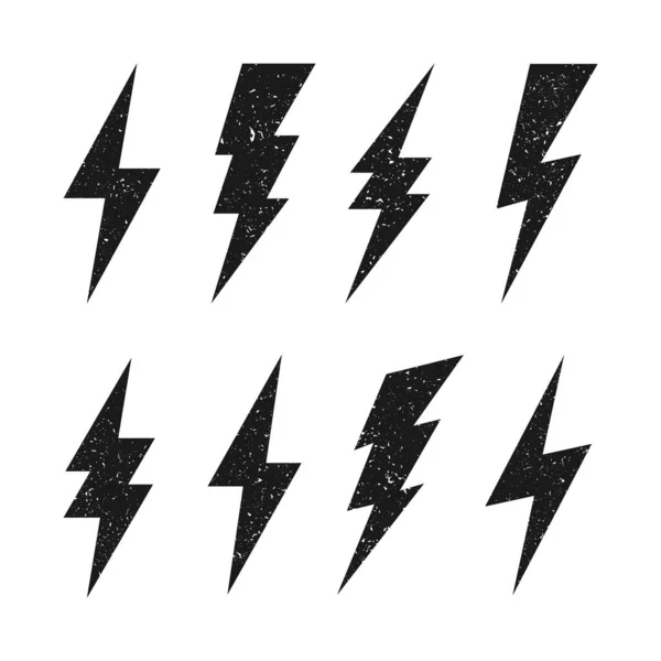 Lightning bolt icons with grunge texture isolated on white background. Vintage flash symbol, thunderbolt. Simple lightning strike sign. Vector illustration. — Stock Vector