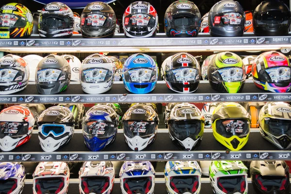 Colors motorcycle helmets on display — Stock Photo, Image