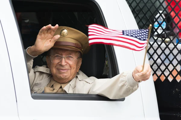 US veteran holding americam flag