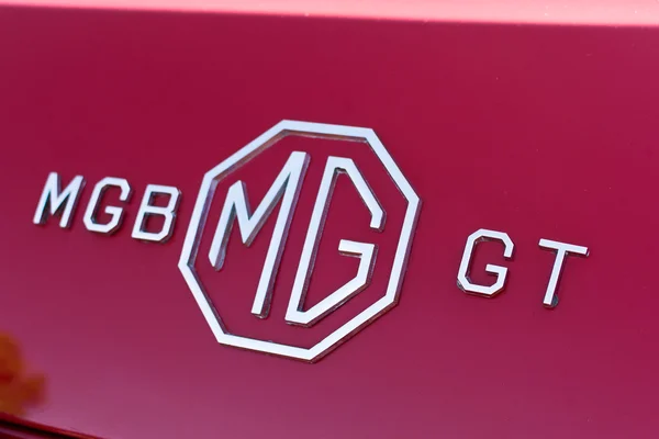 MG emblema en pantalla —  Fotos de Stock