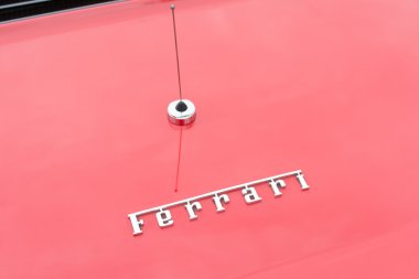 Ferrari 328GTS Targa Convertible Coupe logo on display