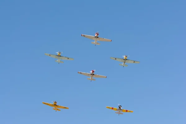 World War II military planes fly