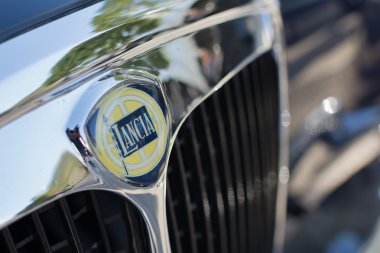 Lancia emblem on display