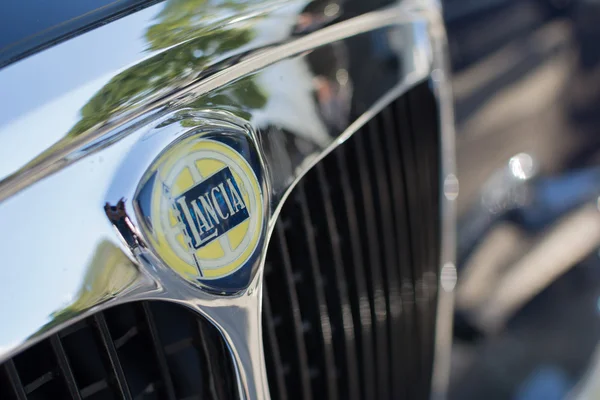 Lancia emblem on display — стокове фото
