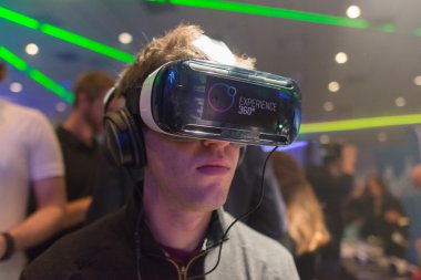 Man tries virtual reality Samsung Gear VR headset