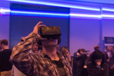 Man tries virtual reality headset