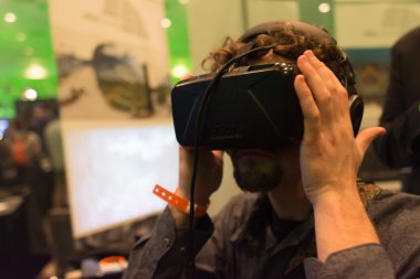 Man tries virtual reality headset