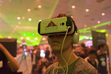 Man tries virtual reality Samsung Gear VR headset