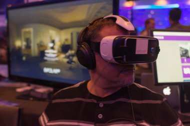 Man tries virtual reality Samsung Gear VR headset