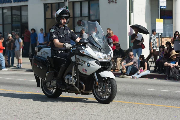 Motorcycle Police officer during the 117th Golden Dragon Parade — Stock Photo, Image