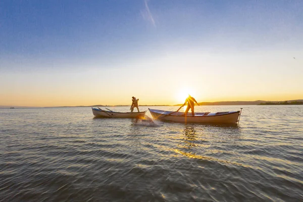 Net fishermen and the sunset / Golyazi - Turkey