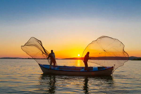 Net fishermen and the sunset / Golyazi - Turkey