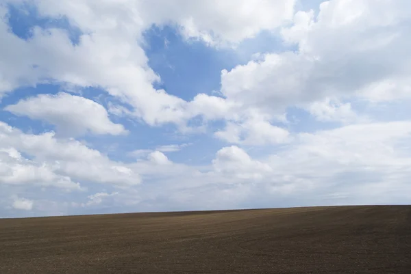 Plowed field on the hill — Stock Photo, Image