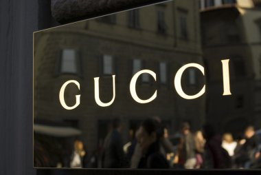 Close up of Gucci logo at store entrance clipart