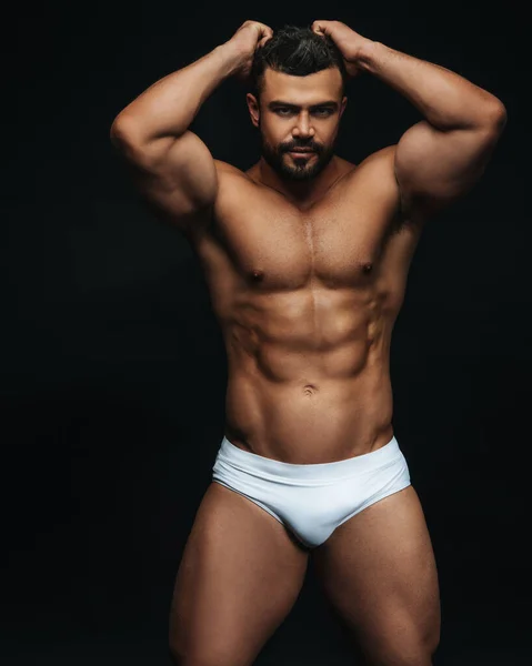 Latino Hunk Bianco Costumi Bagno Sfondo Nero — Foto Stock