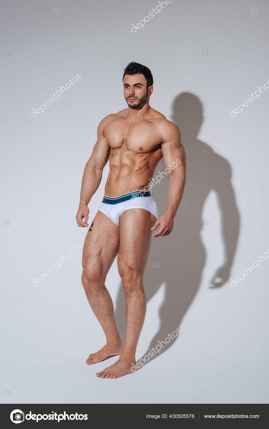 Full Length Portrait Muscular Man Underwear Stock Photo by ©sergelee  430505576