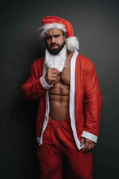 Moving Beard Muscular Man Santa Hat Grey Background Studio Handsome — Stock Photo, Image