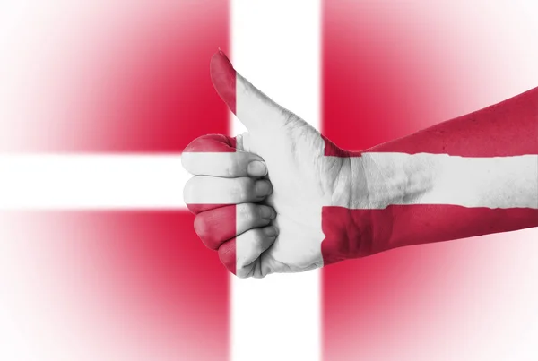 Пальцем вверх для Дании — стоковое фото
