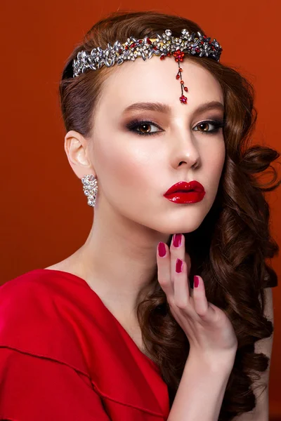 Beauty woman in red dress, red background. Red lips and nails. — Stock Photo, Image