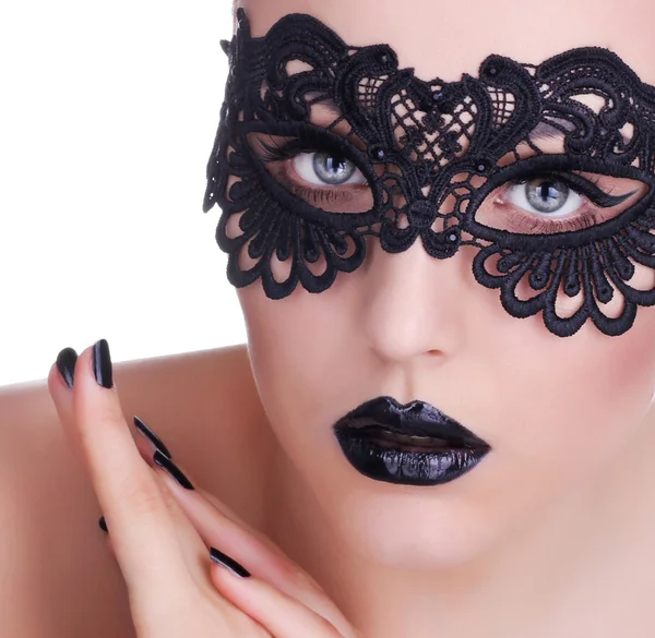 szép nő, fekete csipke maszk a szemére. fekete manic