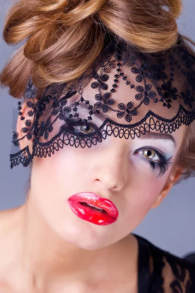 Beautiful Woman with Black Lace mask over her Eyes — Stock Photo, Image