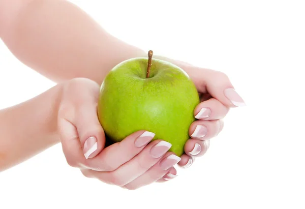 Manzana verde fresca en mano — Foto de Stock