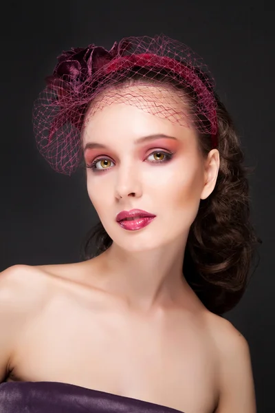 Portrait a face of the beautiful girl with velvet skin and a beautiful fashionable make-up, dark lipstick and a grid a veil on a face — Stock Photo, Image