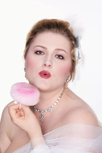 Young lady applying powdered foundation on her face with cosmeti — Stock Photo, Image