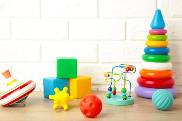 Children's toys collection on a light background. Top view