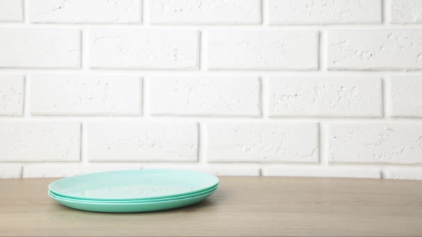 Empty Plate Move White Plate Stack White Background Stop Motion — Stock Video