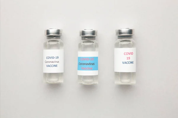 Coronavirus Vacuna Covid 2019 Ncov Frasco Sobre Fondo Gris Vista —  Fotos de Stock
