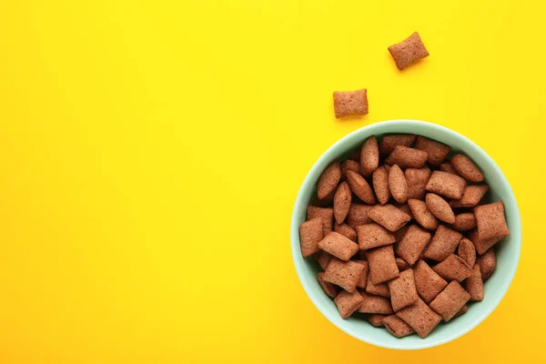 Bowl Chocolate Pads Yellow Background Top View — Stock Photo, Image