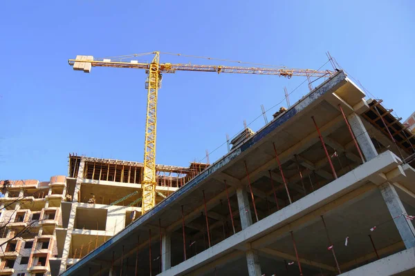 Construction site background. Crane near building. Industrial background.