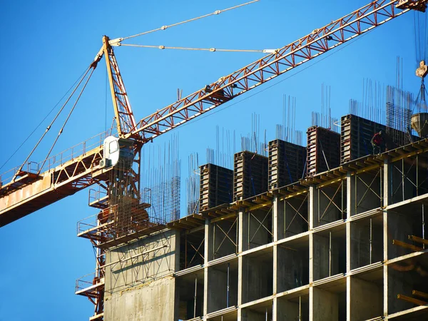 Construction site. Building site with crane. Concrete building under construction
