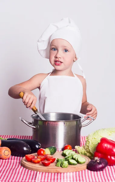 Little chef with many kind of bread — Stock Photo, Image