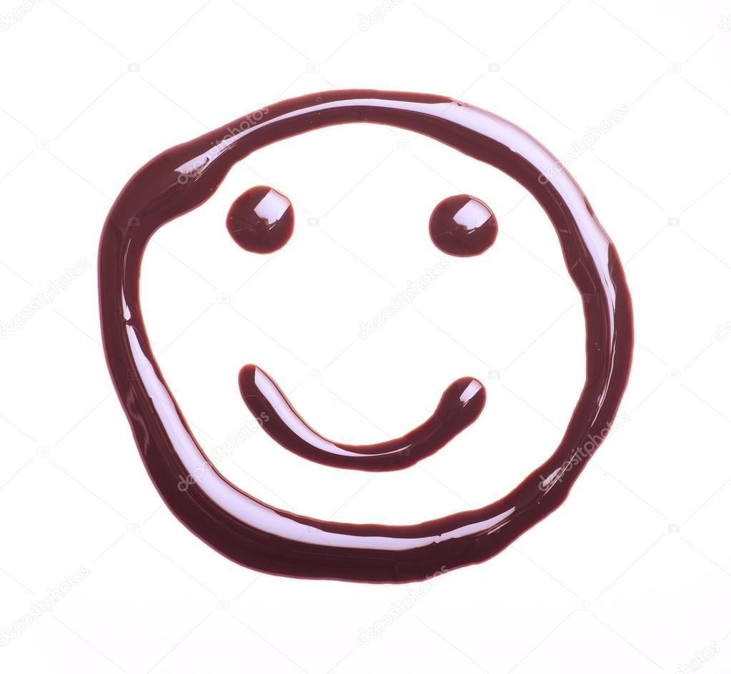 Smiley face made of chocolate syrup