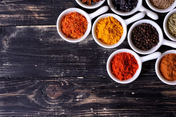 Spices in ceramic bowls — Stock Photo, Image