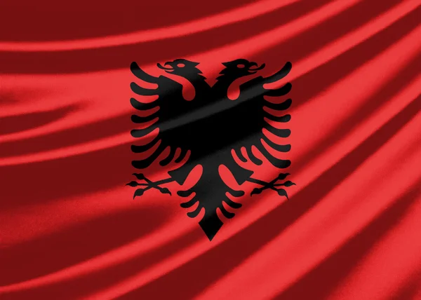 Fahne von Albanien schwenkend — Stockfoto
