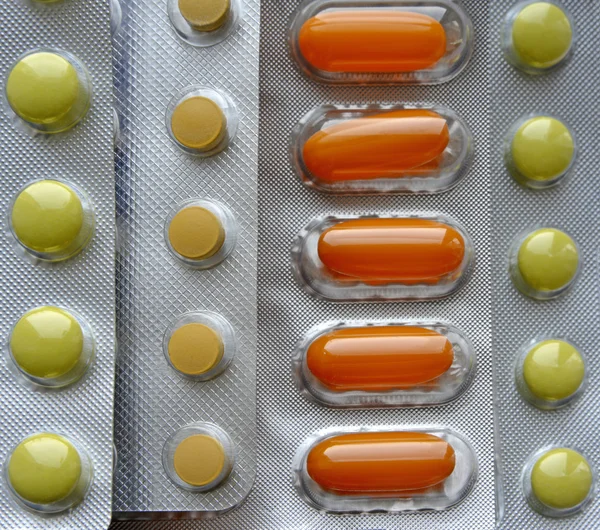 Bright pills in blisters — Stock Photo, Image