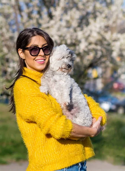 Beautiful Young Woman Hugging Her White Havanese Dog Outdoor Spring — стоковое фото