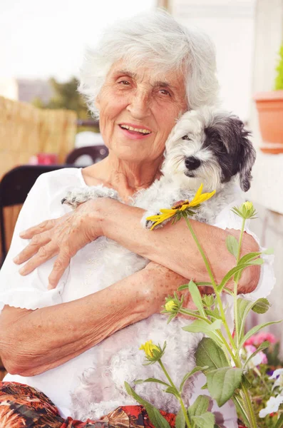 Happy Senior Woman Hugging Her Havanese Dog Home — Stock Photo, Image