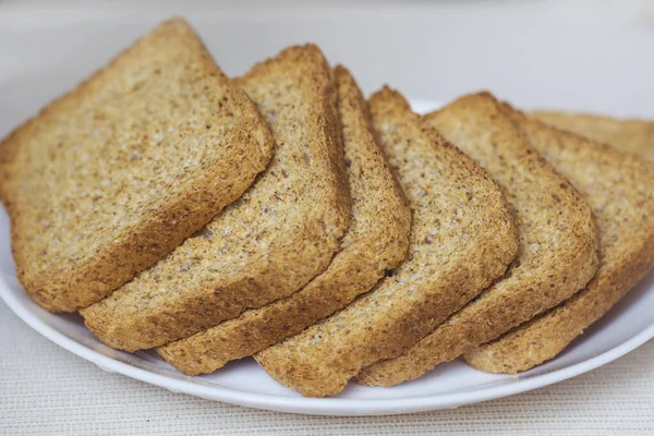 Crispy Hole Grain Rusk White Plate — Stock Photo, Image