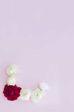 Flower arrangement on a light vertical background. Selective focus. Concept for your mockup and project. Layout, flat lay, copy space, top view. Flower composition.