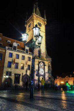 Old City Hall with famous astronomical clock at night, Prague clipart