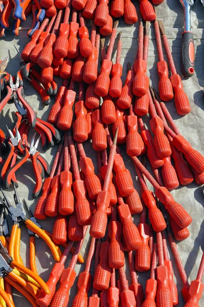 Big bunch of red screwdrivers electric insulated tool