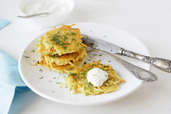 Potatoes pancakes on plate — Stock Photo, Image