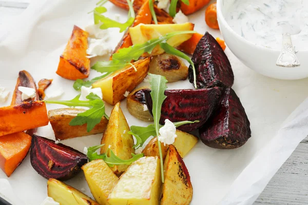 Roasted slice potato, carros and beets — Stock Photo, Image